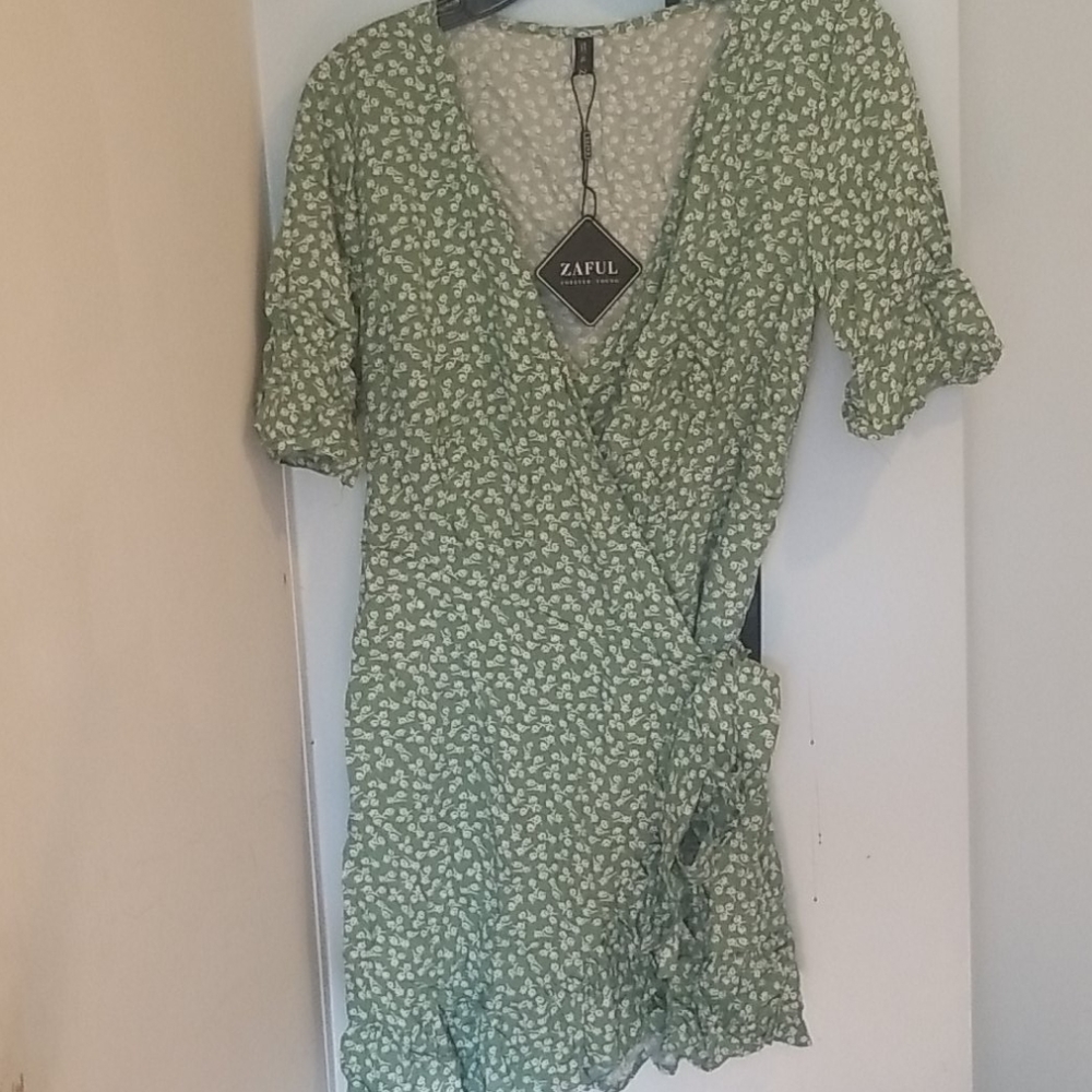 Mini green wrap dress with white flowers